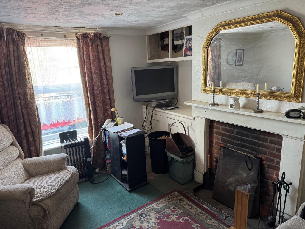 Lot: 102 - PAIR OF FREEHOLD COTTAGES IN A POPULAR VILLAGE LOCATION - The Living Room in Cottage One